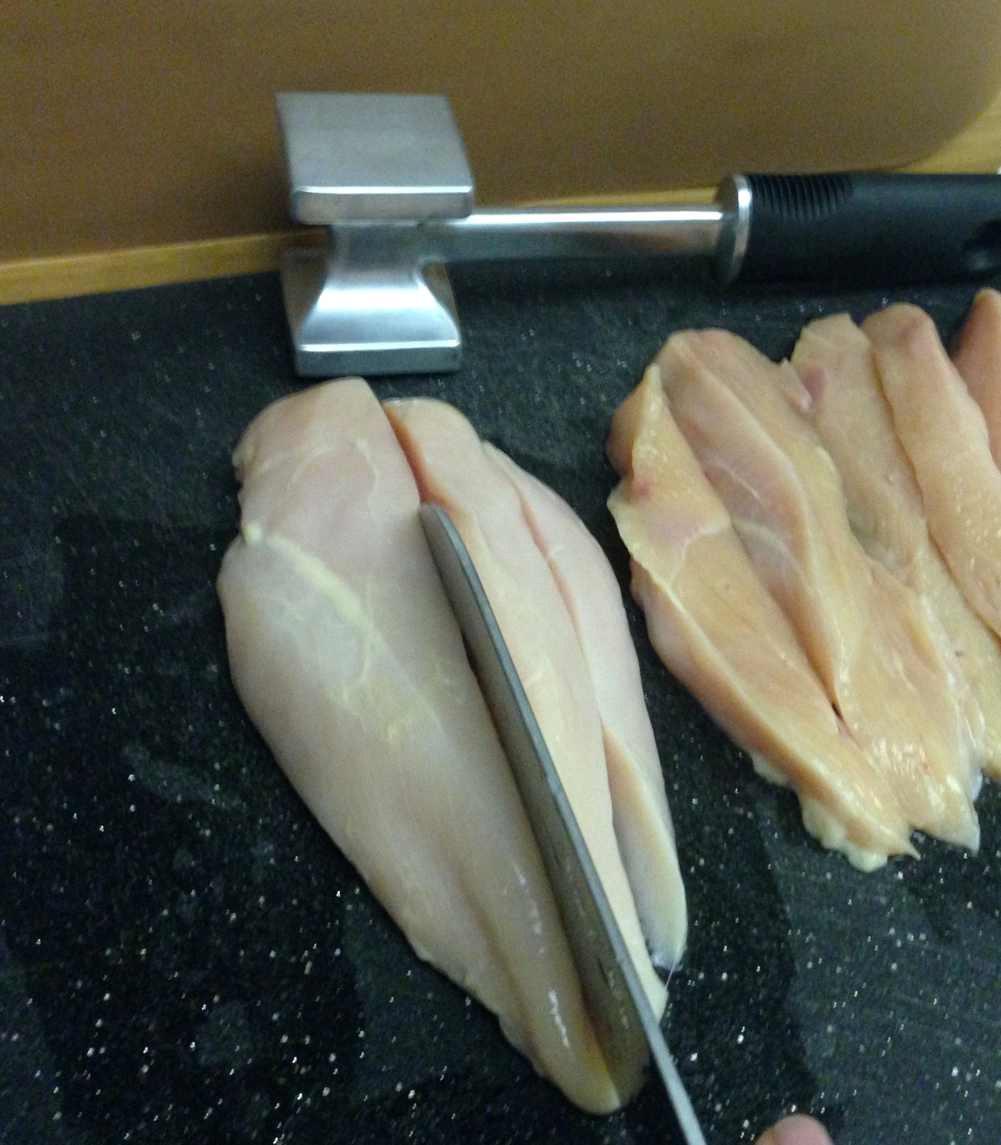 Slice chicken breast into strips