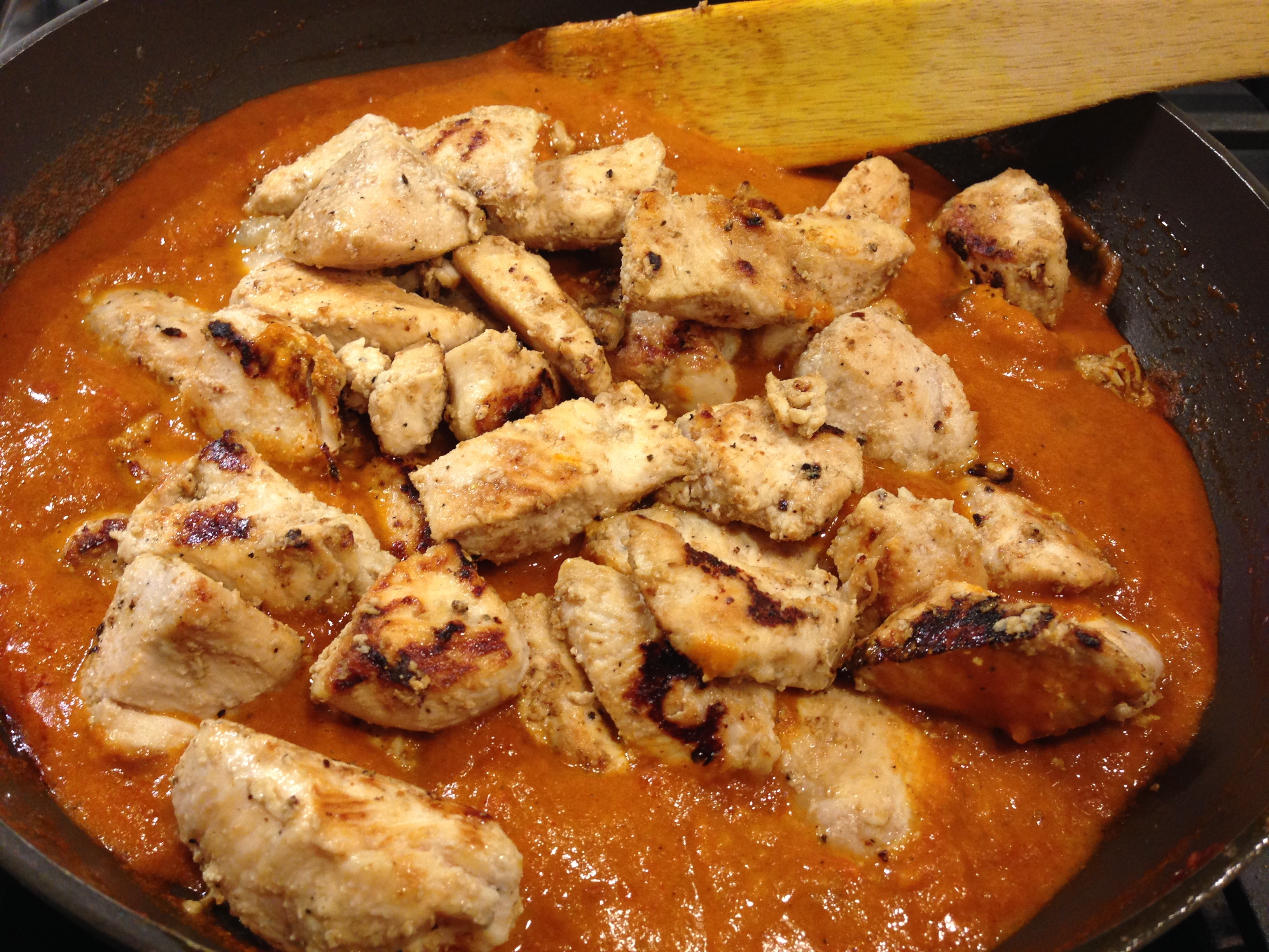 Add chicken back into pan