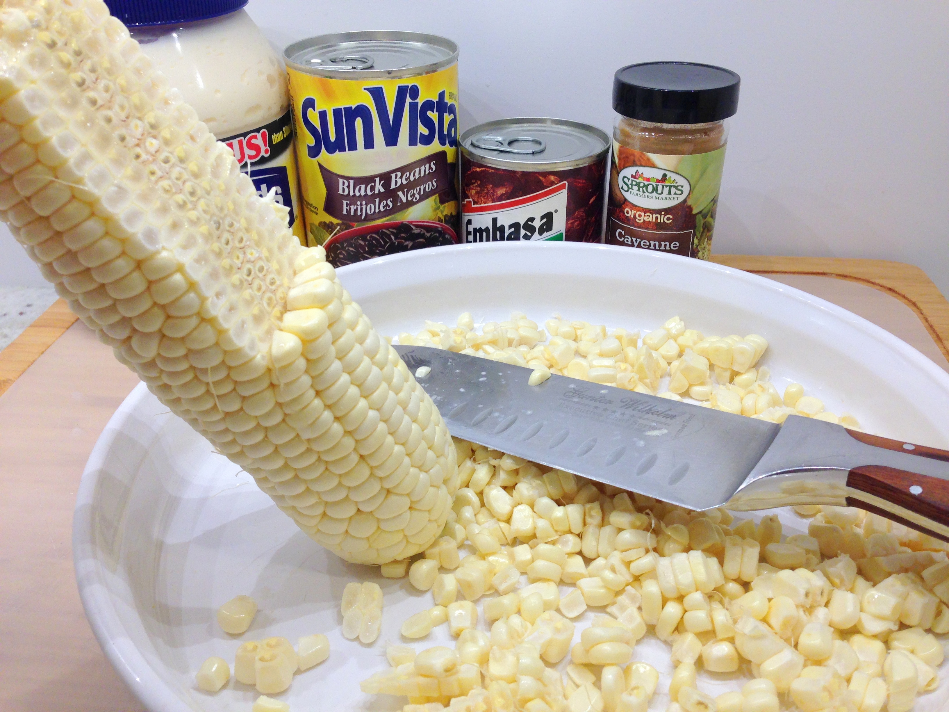 Remove corn from cob