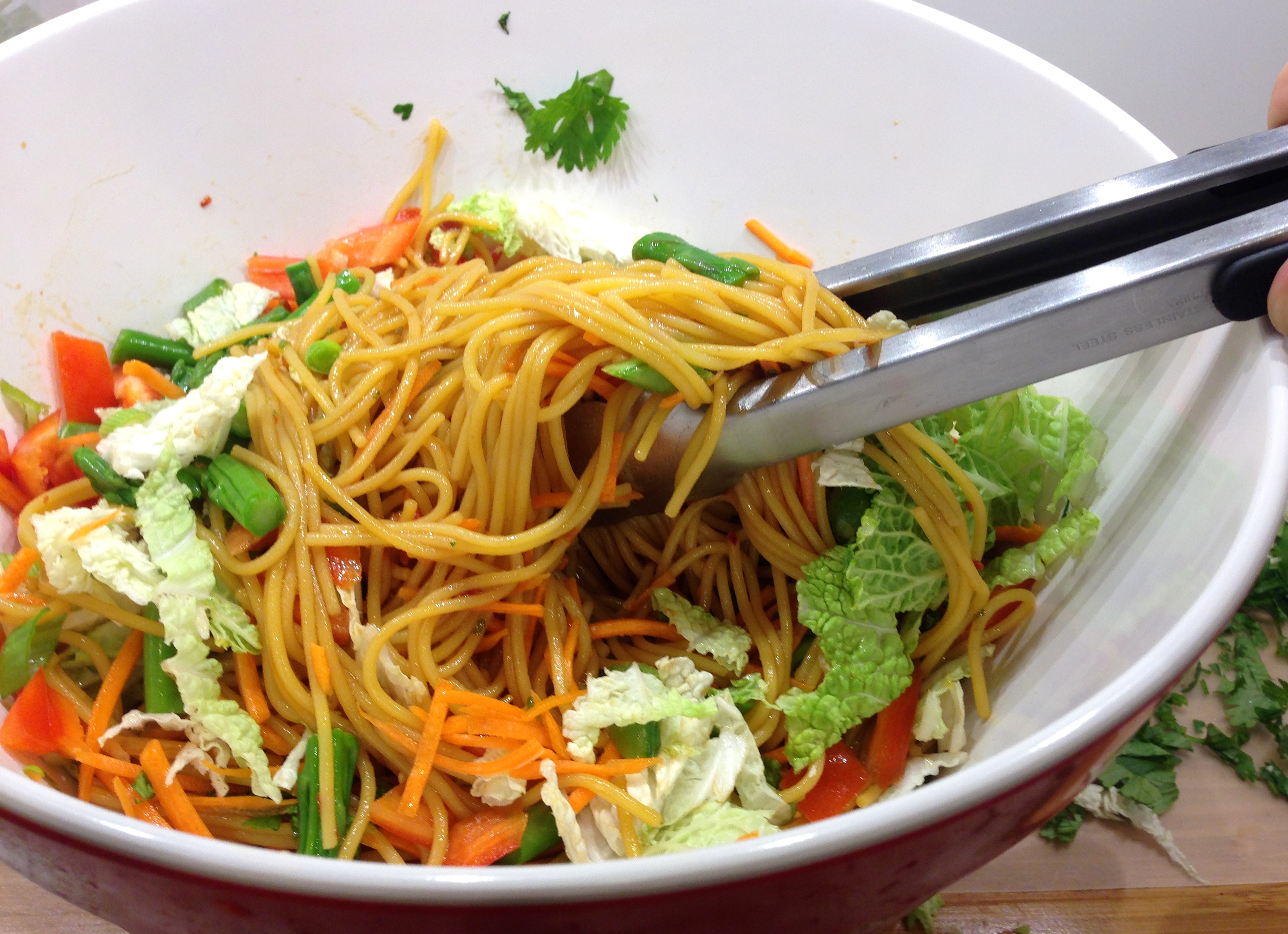 Toss veggies and noodles